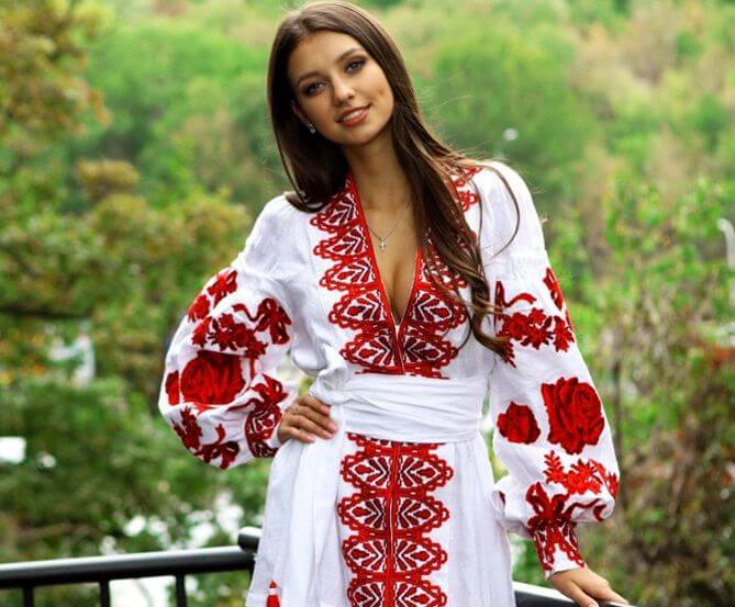 A tanned Ukrainian woman in a national costume