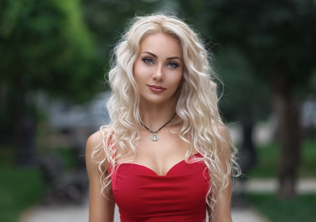 Chic blonde in a sexy red dress